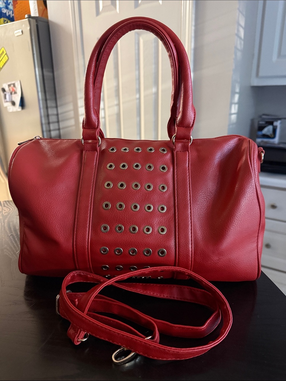CAPRESE Stylish Red Handbag with Eyelet Design